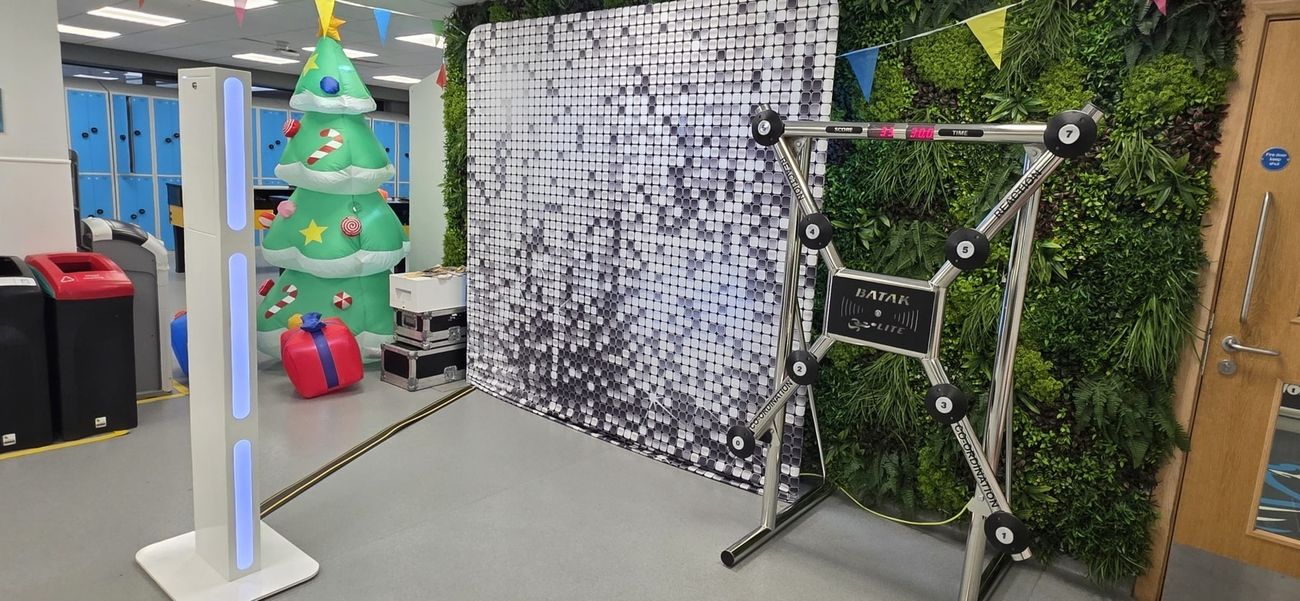 Corporate guests using a Surrey FaceBooth Selfie Pod at an Amazon event