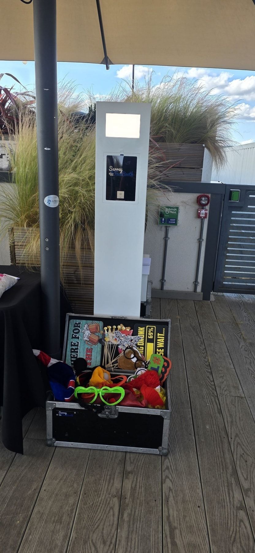 Wedding anniversary guests using a Surrey FaceBooth Selfie Pod at Rooftop at Curzon