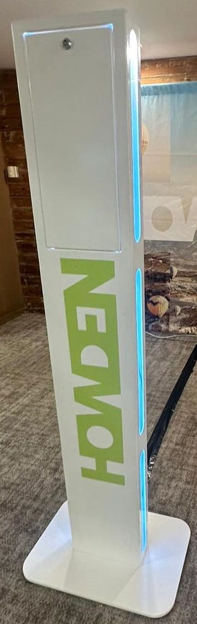 Howden — white floor-mounted totem booth with LED edge lighting